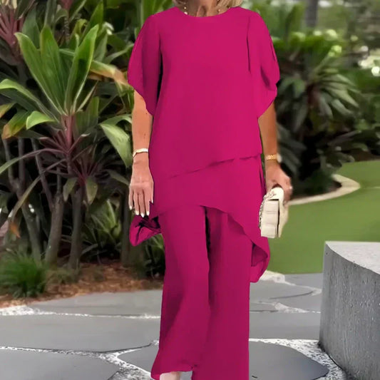 ✨️Nouveaux arrivages✨️Deux-pièces pour femmes : Charmant top asymétrique & pantalon à jambes larges(🔥51 % de réduction)